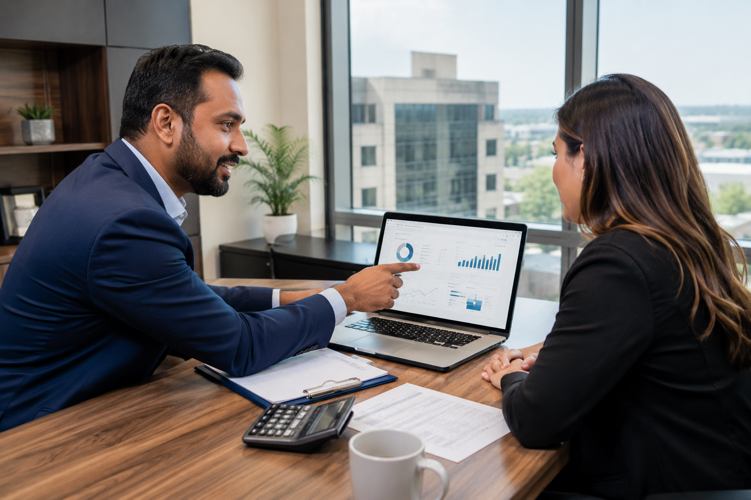 Vaughan business owner meeting with a CPA to review their books